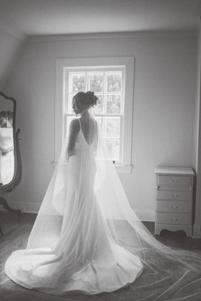 knoxville photographer. bride in front of window at the kincaid house