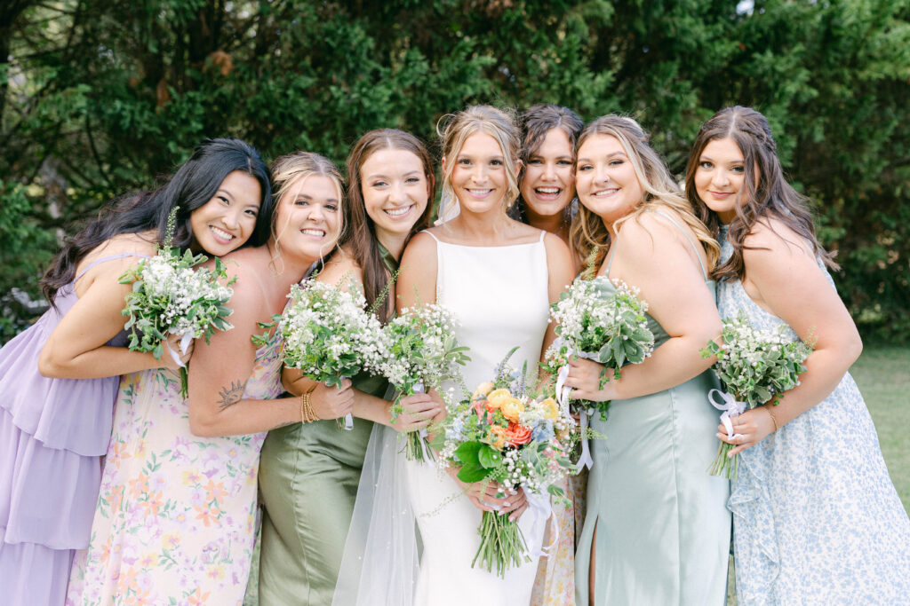 knoxville wedding photographer. bride with bridesmaids at the kincaid house in clinton tn